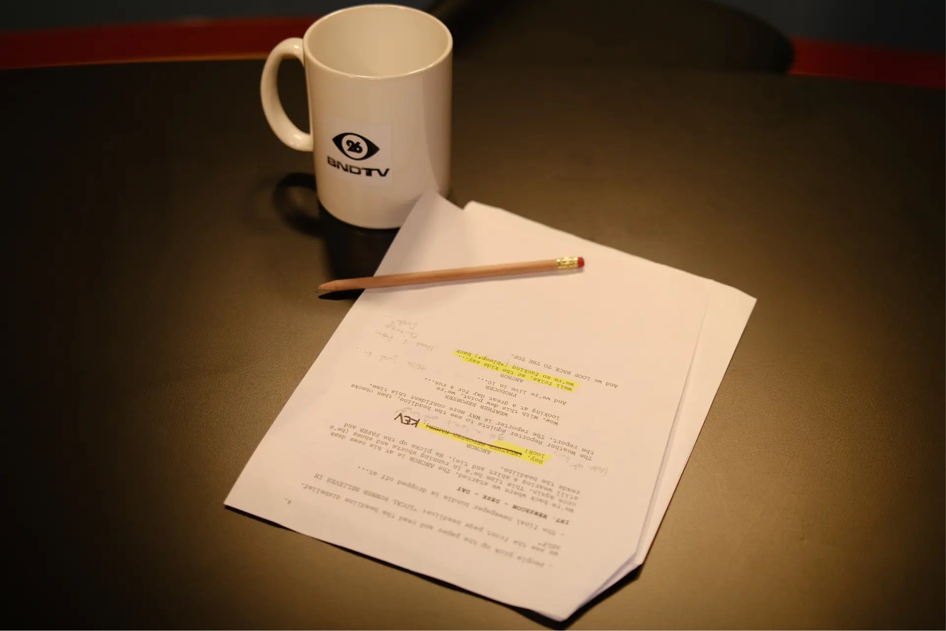 BNDTV mug and marked-up script